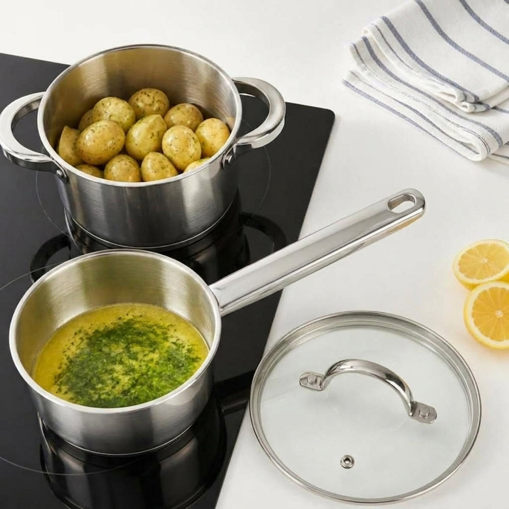 Cookinglife Edelstahl-Kochtopf mit Kartoffeln und Stieltopf mit Kräuterbutter auf Induktion, von oben